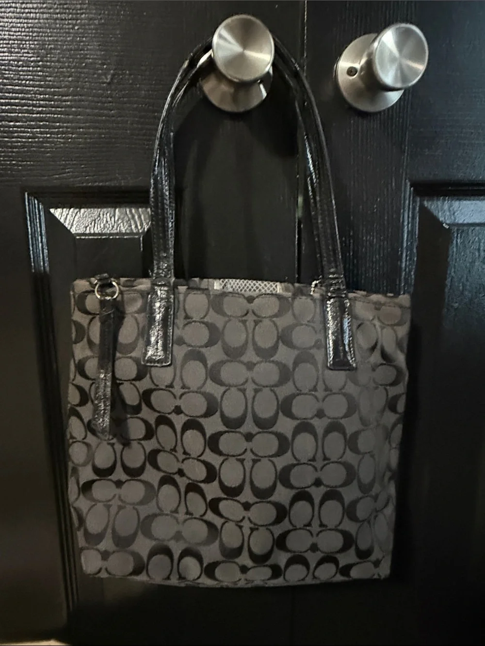 Coach tote featuring